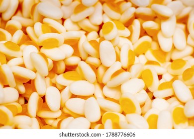 Mini fried eggs candy background. Pick and Mix candy shop. Selective focus 