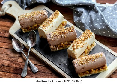 mini frozen log with vanilla chocolate, spread and caramelized apple - Shutterstock ID 1821730847