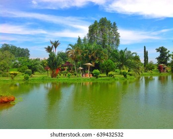 Mini Garden In Kampung Padang Cempedak Tasek Gelugor Penang Malaysia..with Green Scenery And Blue Sky