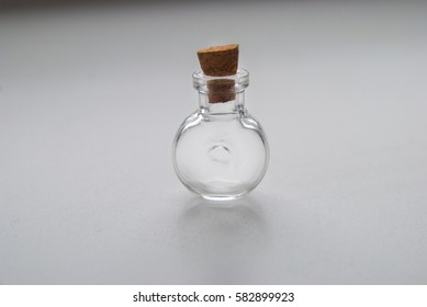 Mini Glass bottle different forms with cork stopper on white background