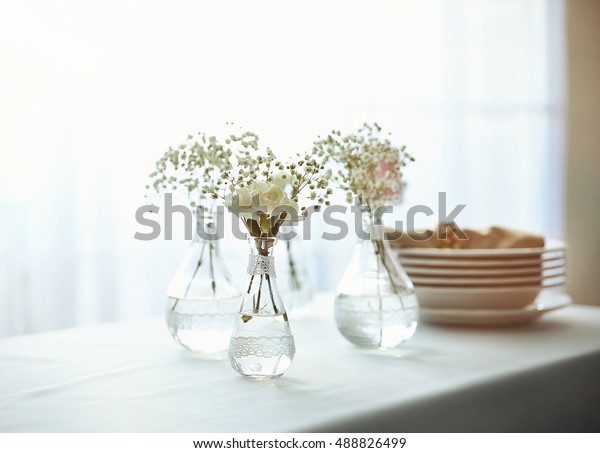 Mini Glass Vases Flowers On Table Stock Photo Edit Now 488826499