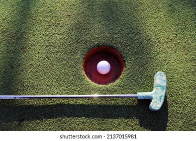 Mini Gold Iron And Ball At A Minigolf Course