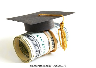 Mini Graduation Cap On A Roll Of Money