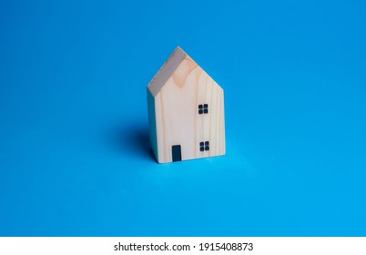 Mini House On Blue  Background