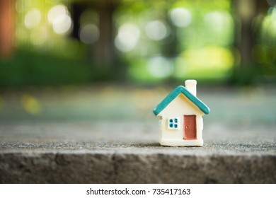 Mini House On Green Nature Background