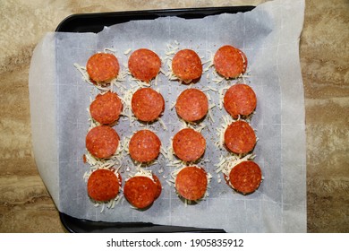 Mini Keto Pizza Bites Ready For Baking With Pepperoni, Cream Cheese And Mozzarella Cheese.