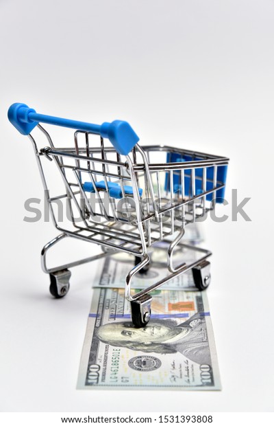 Mini market trolley on\
dollars