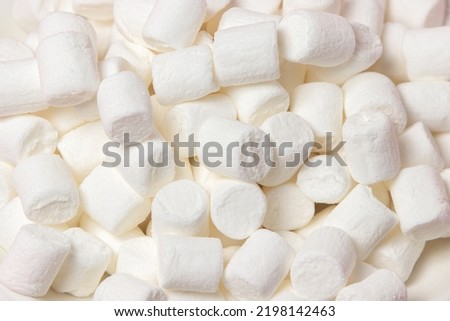 Mini marshmallows as a background for your image. dessert ingredient