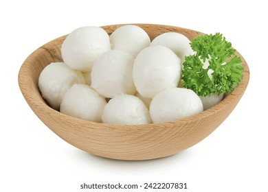 Mini mozzarella balls with parsley in a wooden bowl isolated on white background with full depth of field.