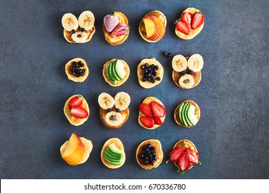 Mini Pancakes With Strawberry, Banana, Avocado, Peach And Blueberry From Above