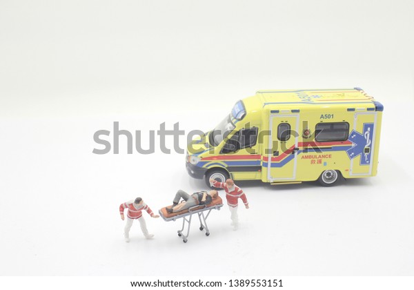 a mini of Paramedics performing first aid at\
ambulance 5 may 2019