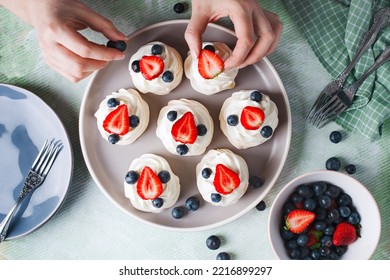 Mini Pavlova Meringue With Whipped Cream And Berries