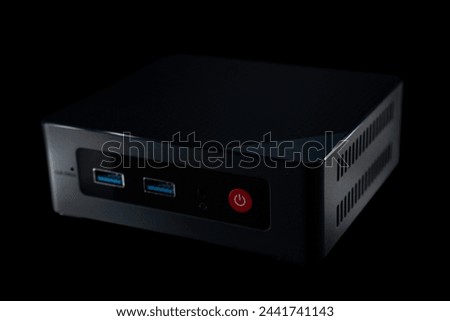 Mini PC. Great computer to use as a HTPC to play games and watch TV shows and movies. Close-up of the front, where USB ports can be seen. High quality 4k footage