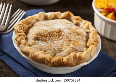 Mini Peach Pie Dessert On A Background