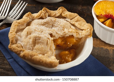 Mini Peach Pie Dessert On A Background