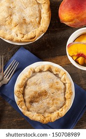 Mini Peach Pie Dessert On A Background