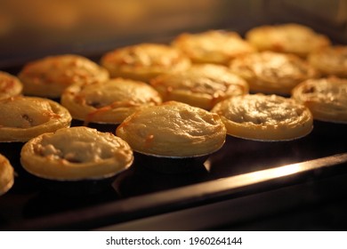 Mini Pie From Meat And Mushrooms Baking In Industrial Oven, Pie And Pastry Wholesale Bakery Factory