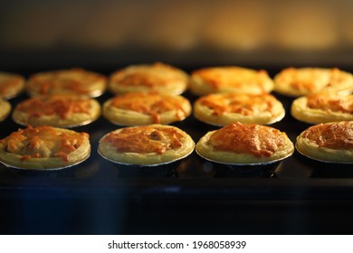 Mini Pie From Meat And Mushrooms Baking In Industrial Oven, Pie And Pastry Wholesale Bakery Factory