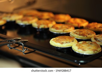 Mini Pie From Meat And Mushrooms Baking In Industrial Oven, Pie And Pastry Wholesale Bakery Factory