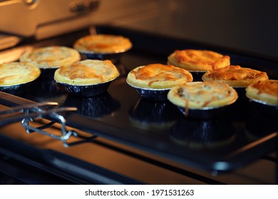 Mini Pie From Meat And Mushrooms Baking In Industrial Oven, Pie And Pastry Wholesale Bakery Factory