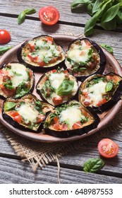 Mini Pizza With Eggplant , Tomato And Basil .