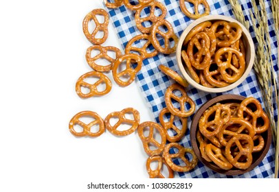 Mini Pretzel In Wooden Bowl On White Background. Top View