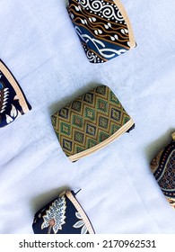 mini purse with batik pattern on white background