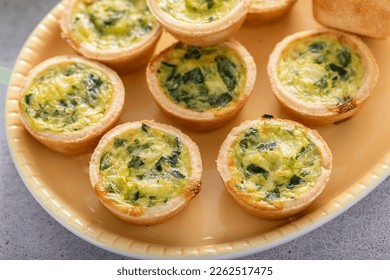 Mini quiches with spinach for Easter brunch, quiche florentine