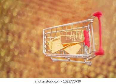 Mini Red Cart Gold Bar Inside Business Growth Wealth Financial Concept With Space