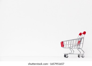 mini red shopping cart shop concept
