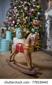 Mini Rocking Horse Wood Chair On Christmas Background