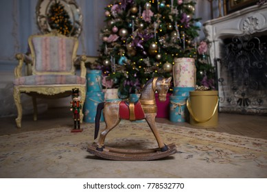 Mini Rocking Horse Wood Chair On Christmas Background