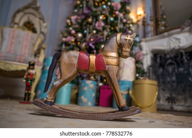 Mini Rocking Horse Wood Chair On Christmas Background