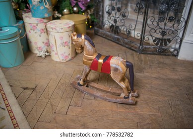 Mini Rocking Horse Wood Chair On Christmas Background