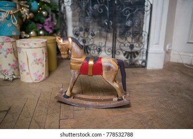 Mini Rocking Horse Wood Chair On Christmas Background