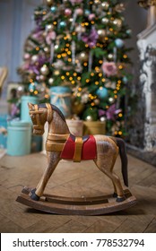 Mini Rocking Horse Wood Chair On Christmas Background