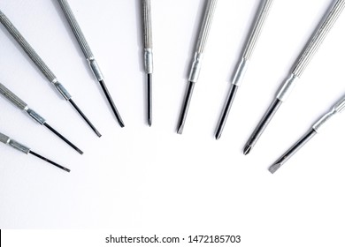 Mini screwdriver set closeup macro isolated on white background
