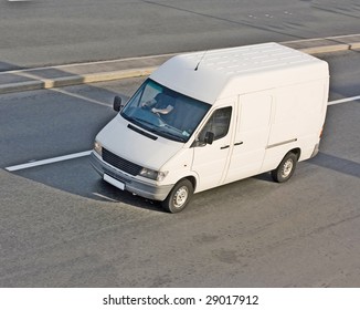 Mini Small Passenger Tour Van Bus On Road Isolated