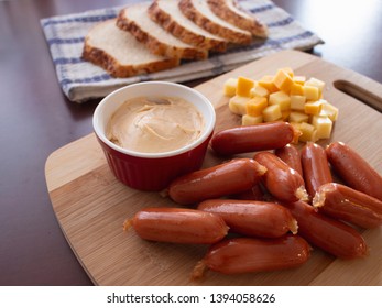 Mini Smoked Sausages Cocktail Wieners with Spicy Dip Mix of Cheese Cubes and Potato Bread Slices