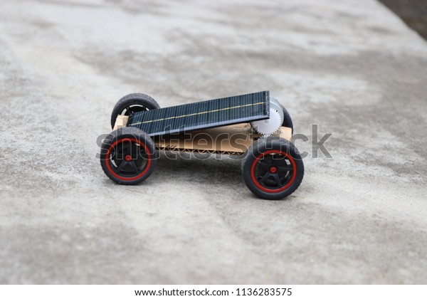 Mini Solar Car,here the solar cell absorbs energy\
from sunlight and provides power to run the DC MOTOR which drives\
the wheels of the car