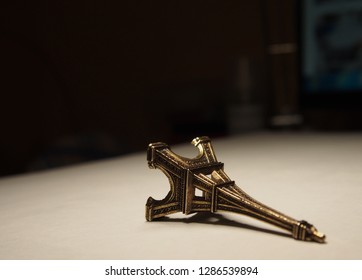 Mini statue of Eiffel tower. Background.