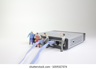 a mini Technicians connecting network of cable