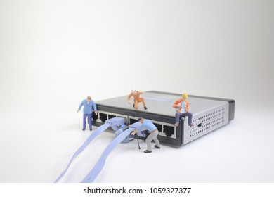 a mini Technicians connecting network of cable