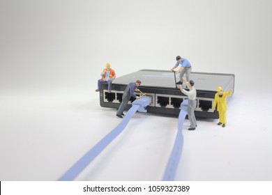 a mini Technicians connecting network of cable