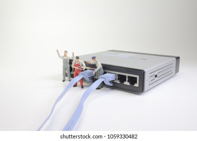 a mini Technicians connecting network of cable