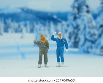 Mini toy of action figure at outdoor with blurred background. Toy photography concept design. Minifigure of people character at snow land with warm jacket. - Powered by Shutterstock