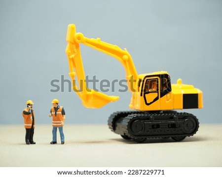 Mini toy at table with blurred background.