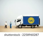Mini toy at table with white background. Industrial shipping concept. Atlanta flag design, is the capital and most populous city of the U.S. United State of Georgia.