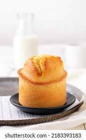 
Mini Vanilla Cake With Orange Extract On Black Plate And White Background, Cupcake Recipe