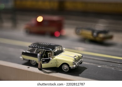 Miniature 1950s Man Standing With Car Door Open